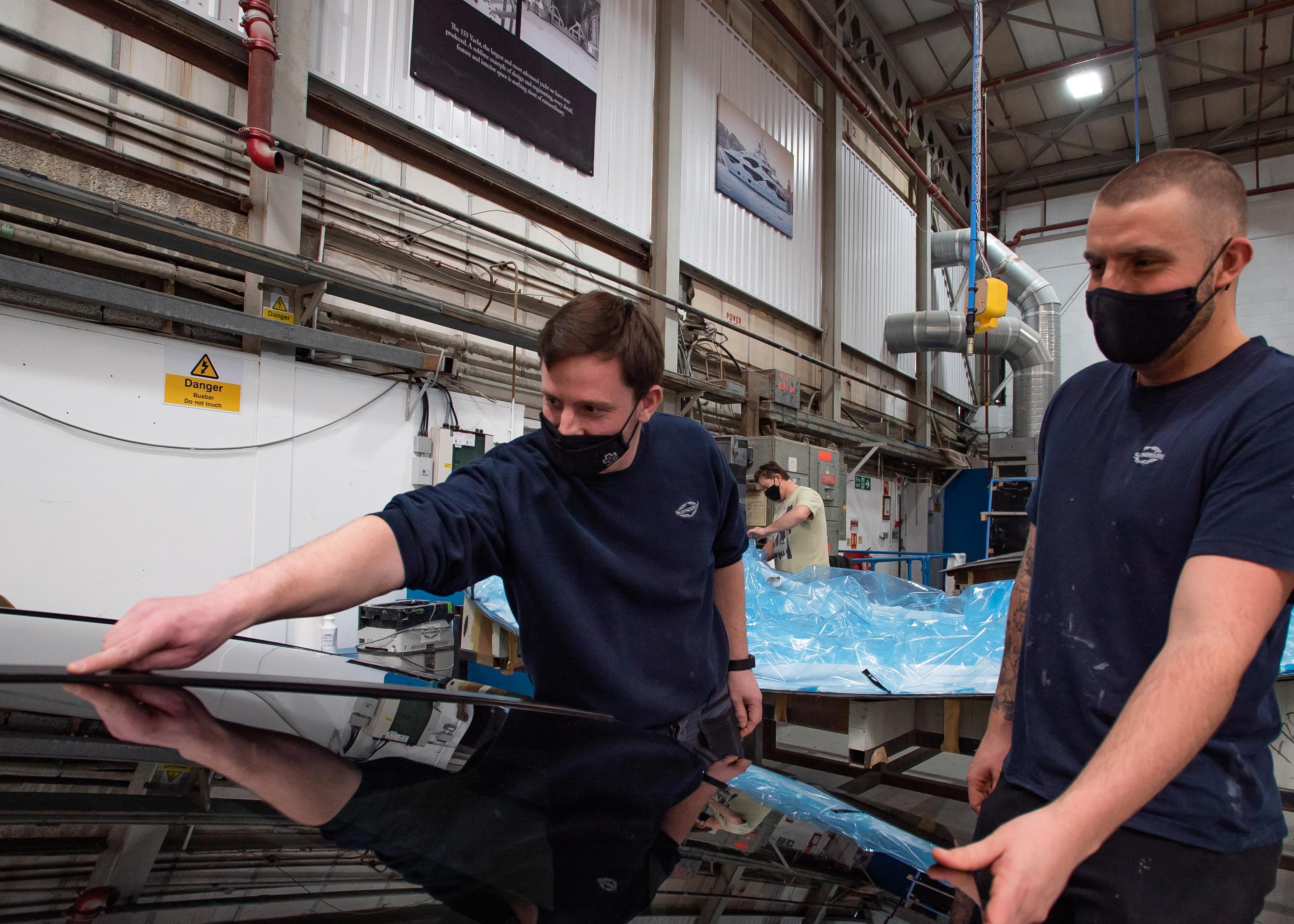 Sunseeker team working on yacht Sunseeker team working on yacht