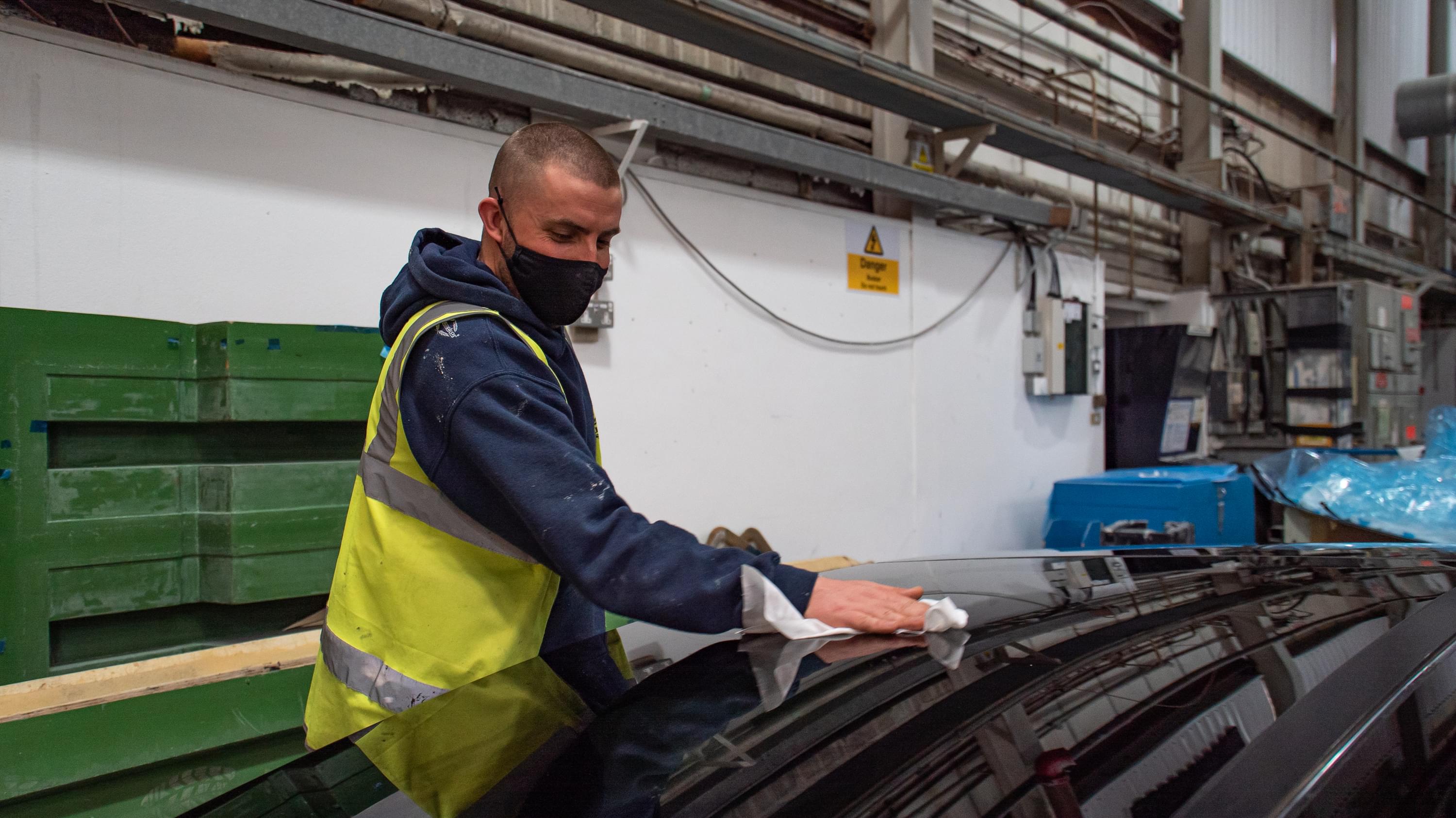 Sunseeker Yacht builder polishes glazing for yacht structure Sunseeker Yacht builder polishes glazing for yacht structure